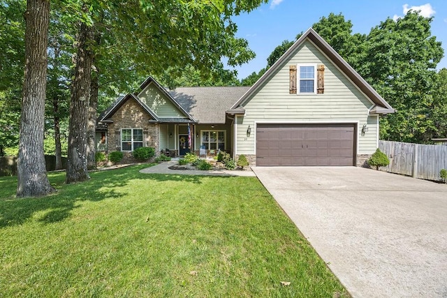 26 Primrose Ln, Bella Vista, AR 72714 - view of front of house featuring stone siding and concrete driveway
