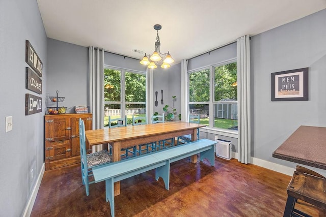 26 Primrose Ln, Bella Vista, AR 72714 - dining area featuring baseboards, a chandelier, and healthy amount of natural light