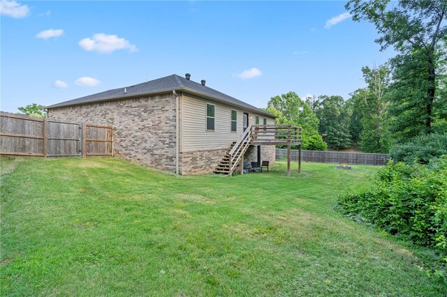 1505 S K Pl, Rogers, AR 72756 - view of yard featuring stairs and a deck