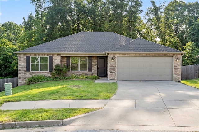 1505 S K Pl, Rogers, AR 72756 - ranch-style home featuring an attached garage, driveway, a shingled roof, and brick siding