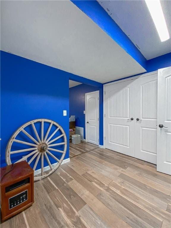 108 Clive St, Berryville, AR 72616 - bonus room with wood finished floors, baseboards, and beamed ceiling