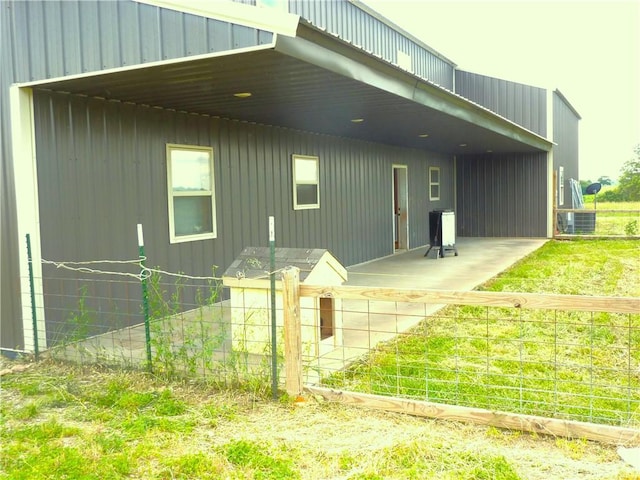 6611 Mc 4010, Everton, AR 72633 - back of house featuring cooling unit and a patio
