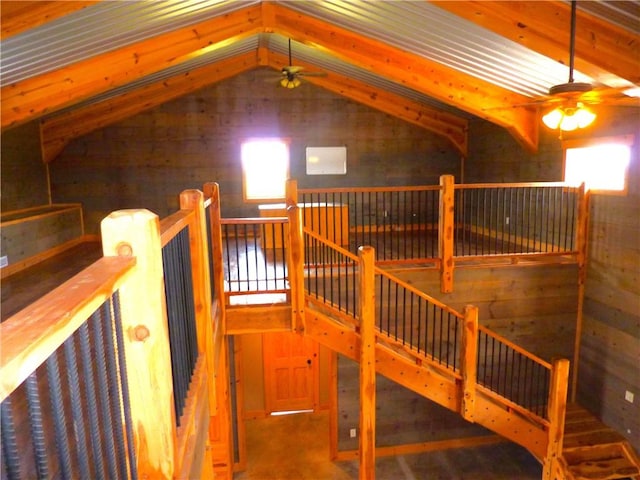 6611 Mc 4010, Everton, AR 72633 - staircase with ceiling fan, wood walls, and lofted ceiling
