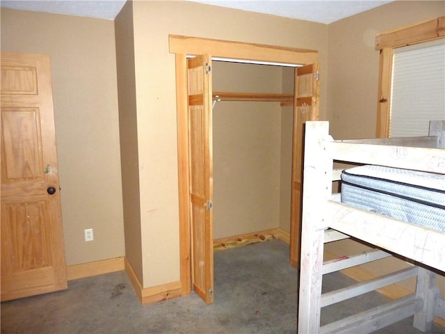 6611 Mc 4010, Everton, AR 72633 - unfurnished bedroom featuring a closet, baseboards, and carpet floors