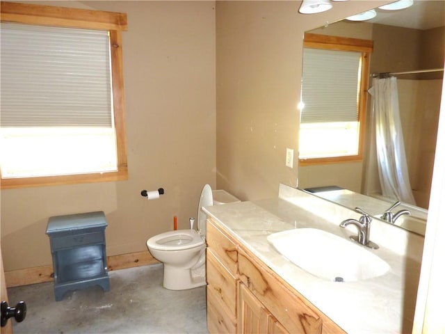 6611 Mc 4010, Everton, AR 72633 - bathroom featuring vanity, toilet, concrete floors, a shower with curtain, and baseboards