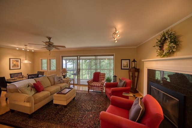 122 Hillcrest Rd, Eureka Springs, AR 72631 - living area featuring track lighting, crown molding, a ceiling fan, and baseboards