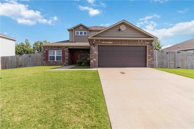 501 W Pittsfield, Siloam Springs, AR 72761 - view of front facade with brick siding, driveway, and an attached garage