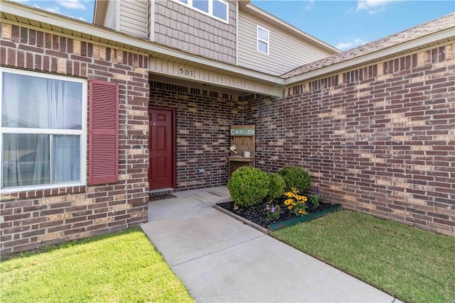 501 W Pittsfield, Siloam Springs, AR 72761 - view of exterior entry featuring brick siding