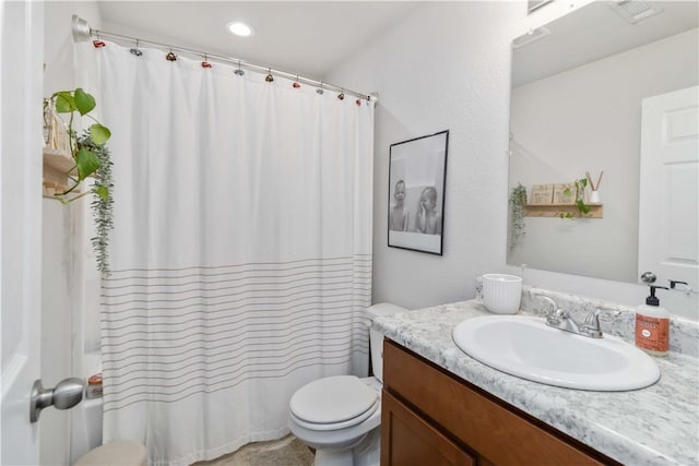 501 W Pittsfield, Siloam Springs, AR 72761 - bathroom featuring toilet, vanity, a shower with shower curtain, and recessed lighting