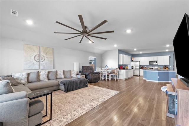 615 W Dusty Ct, Siloam Springs, AR 72761 - living room with ceiling fan, wood finished floors, and recessed lighting