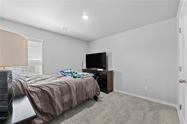 615 W Dusty Ct, Siloam Springs, AR 72761 - bedroom featuring light colored carpet and baseboards