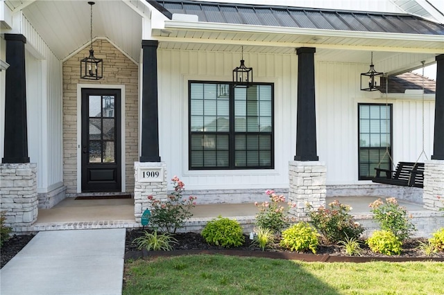 1909 Crump St, Pea Ridge, AR 72751 - view of exterior entry with covered porch