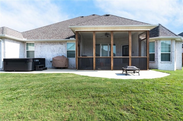 1909 Crump St, Pea Ridge, AR 72751 - rear view of house featuring a hot tub, a sunroom, a patio area, a shingled roof, and brick siding