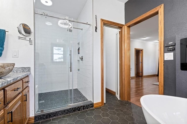 5 Augusta Ln, Holiday Island, AR 72631 - full bathroom featuring a shower stall, a soaking tub, crown molding, vanity, and tile patterned floors