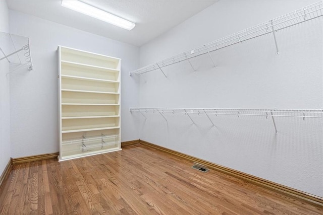 5 Augusta Ln, Holiday Island, AR 72631 - walk in closet with wood finished floors