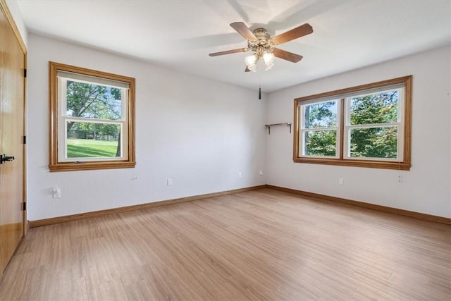 5 Augusta Ln, Holiday Island, AR 72631 - spare room featuring light wood-style flooring, baseboards, and a ceiling fan
