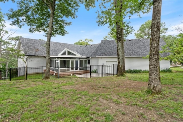 5 Augusta Ln, Holiday Island, AR 72631 - back of property featuring a garage, a sunroom, and roof with shingles