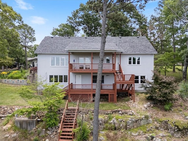 5 Augusta Ln, Holiday Island, AR 72631 - back of house with stairway, a wooden deck, and a shingled roof