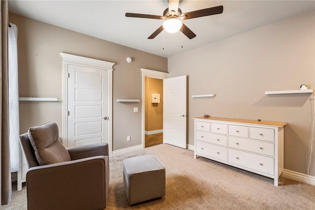 700 SE Yale St, Bentonville, AR 72712 - living area featuring ceiling fan and light carpet