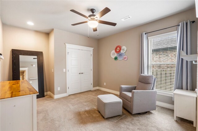700 SE Yale St, Bentonville, AR 72712 - sitting room with ceiling fan and carpet