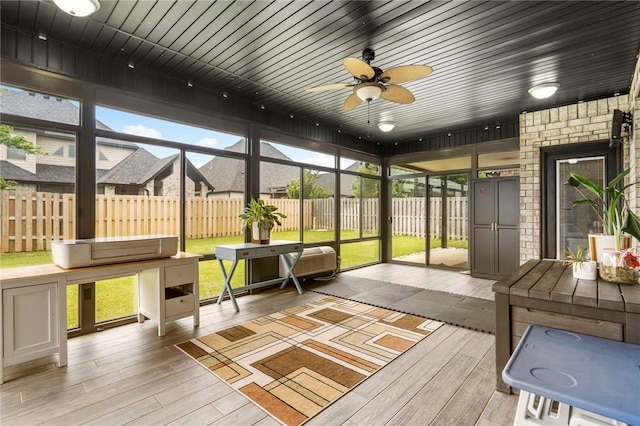 700 SE Yale St, Bentonville, AR 72712 - sunroom with a ceiling fan and healthy amount of natural light