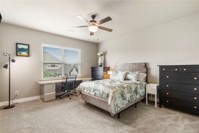 700 SE Yale St, Bentonville, AR 72712 - carpeted bedroom with an office area and a ceiling fan