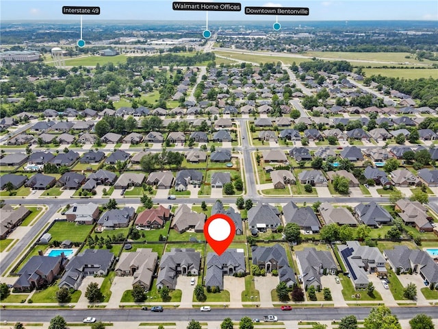 700 SE Yale St, Bentonville, AR 72712 - aerial overview of property's location with nearby suburban area