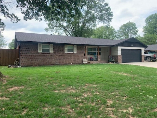 712 Carlton St, Springdale, AR 72762 - single story home featuring brick siding, a garage, and driveway