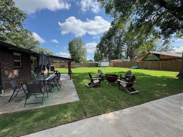 712 Carlton St, Springdale, AR 72762 - view of yard with a fire pit and a patio