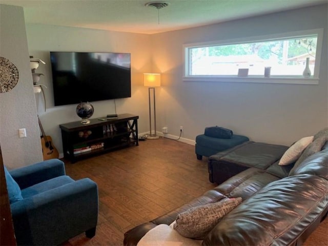 712 Carlton St, Springdale, AR 72762 - living area with wood finished floors and baseboards
