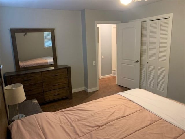 712 Carlton St, Springdale, AR 72762 - bedroom with a closet and baseboards