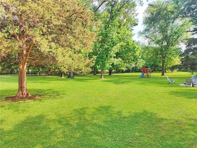 9225 Charles St, Rogers, AR 72756 - view of property's community with a lawn