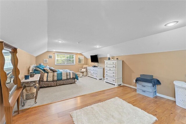 9225 Charles St, Rogers, AR 72756 - bedroom with wood finished floors and lofted ceiling