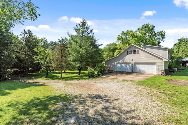 9225 Charles St, Rogers, AR 72756 - view of side of property with driveway and a lawn