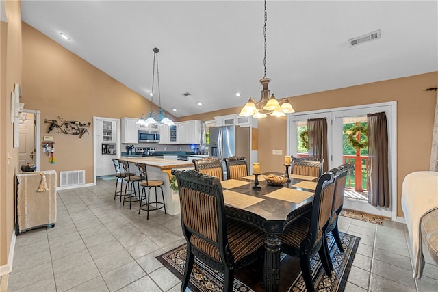 9225 Charles St, Rogers, AR 72756 - dining space featuring a chandelier, high vaulted ceiling, light tile patterned floors, and recessed lighting