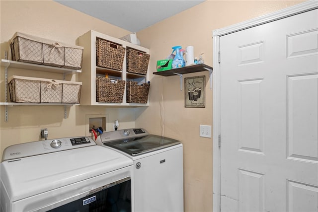 9225 Charles St, Rogers, AR 72756 - laundry room featuring independent washer and dryer