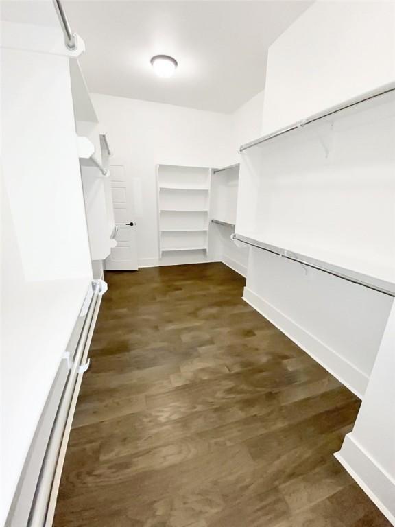 1432 Cannon Ln, Cave Springs, AR 72718 - walk in closet featuring wood finished floors