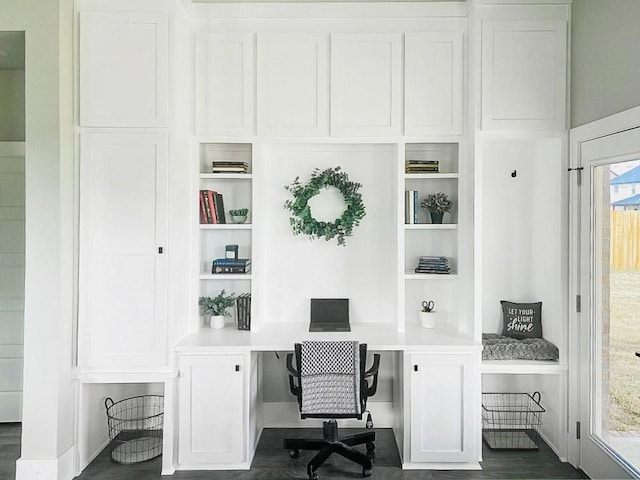 1432 Cannon Ln, Cave Springs, AR 72718 - office area with built in study area, built in shelves, and dark wood-type flooring