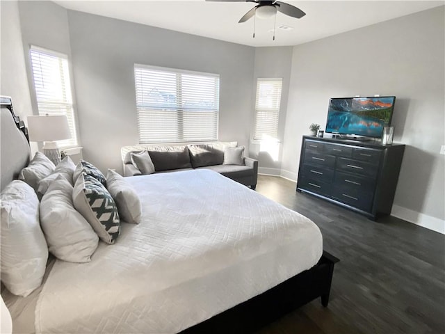 1432 Cannon Ln, Cave Springs, AR 72718 - bedroom featuring dark wood-style flooring, multiple windows, and a ceiling fan
