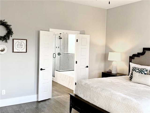1432 Cannon Ln, Cave Springs, AR 72718 - bedroom with wood finished floors and baseboards