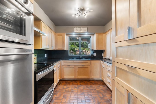 7 El Dorado Dr, Holiday Island, AR 72631 - kitchen featuring light brown cabinets, stainless steel appliances, dark countertops, and brick patterned floors