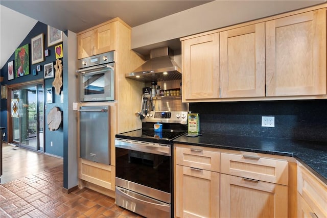 7 El Dorado Dr, Holiday Island, AR 72631 - kitchen with light brown cabinets, appliances with stainless steel finishes, brick floors, wall chimney range hood, and baseboards