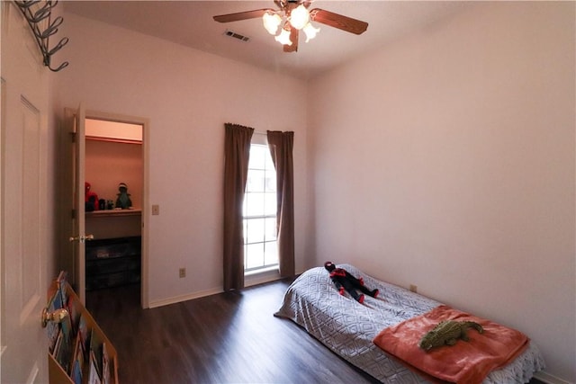 810 N 26th St, Rogers, AR 72756 - bedroom with wood finished floors, baseboards, and ceiling fan