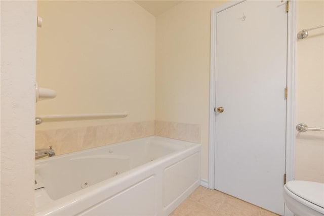 24 Meadow Lark Ln, Harrison, AR 72601 - full bath featuring a tub with jets, toilet, and tile patterned floors