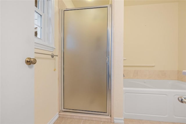 24 Meadow Lark Ln, Harrison, AR 72601 - bathroom featuring a stall shower, tile patterned flooring, and a garden tub