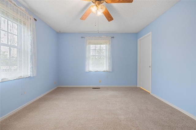 24 Meadow Lark Ln, Harrison, AR 72601 - carpeted empty room with ceiling fan, baseboards, and a textured ceiling