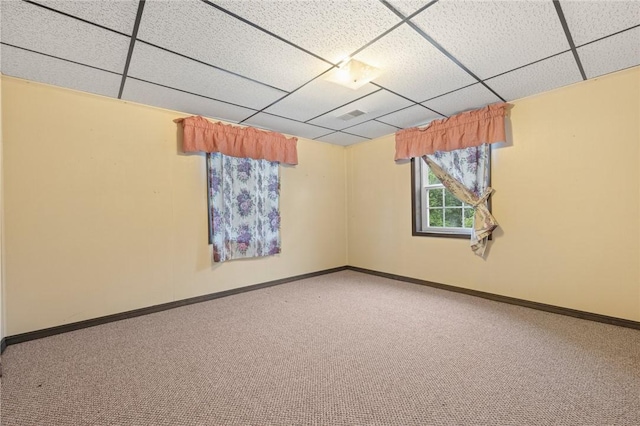 24 Meadow Lark Ln, Harrison, AR 72601 - spare room featuring a drop ceiling, carpet flooring, and baseboards