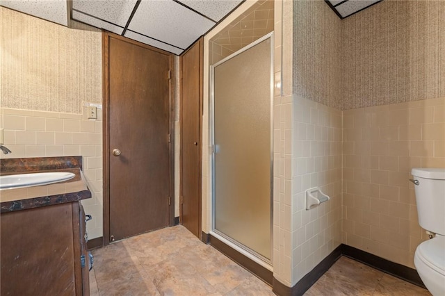 24 Meadow Lark Ln, Harrison, AR 72601 - full bathroom with toilet, tile walls, a stall shower, and vanity