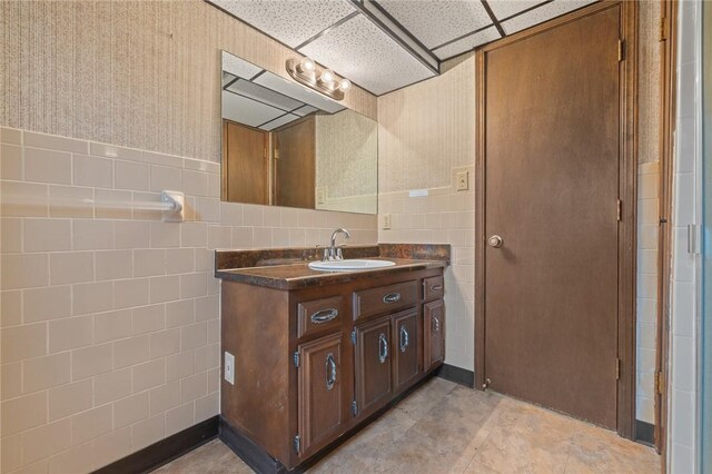 24 Meadow Lark Ln, Harrison, AR 72601 - bathroom featuring vanity and tile walls
