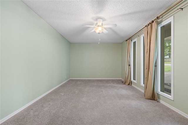 24 Meadow Lark Ln, Harrison, AR 72601 - empty room with a ceiling fan, carpet, a textured ceiling, and baseboards
